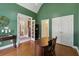 Spacious office featuring hardwood floors, French doors, and neutral decor at 1125 Fairview Club Cir, Dacula, GA 30019