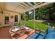 Inviting covered patio with comfortable seating, perfect for outdoor dining and entertaining at 1125 Fairview Club Cir, Dacula, GA 30019