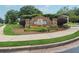 Attractive Apalachee Farms community signage with stone accents and lush floral display at 1125 Fairview Club Cir, Dacula, GA 30019