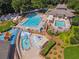 Aerial view of a community swimming pool and lounge area, perfect for relaxation and recreation at 1125 Fairview Club Cir, Dacula, GA 30019