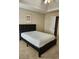 Bedroom featuring a bed, ceiling fan, and ample natural light at 1441 Saint George Pl, Conyers, GA 30012