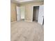 Neutral bedroom with two doors, carpeting, and ample natural light at 1441 Saint George Pl, Conyers, GA 30012