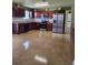 Spacious kitchen with stainless steel appliances and granite countertops at 1441 Saint George Pl, Conyers, GA 30012