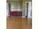 Living room featuring built-in cabinets, granite counter top and a closet at 1441 Saint George Pl, Conyers, GA 30012
