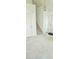 Bright foyer with neutral carpet and staircase to the second floor at 116 Ventura Trl, Stockbridge, GA 30281