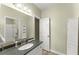 Bathroom features a granite countertop and white cabinets at 2323 Blackberry Ct, Snellville, GA 30078