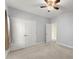 Bedroom with gray walls, large closet, and view to the next room at 2323 Blackberry Ct, Snellville, GA 30078