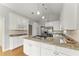 Kitchen featuring granite countertops, white cabinets, and stainless steel appliances at 2323 Blackberry Ct, Snellville, GA 30078