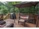Back deck with furniture and grill at 241 Lost Lake Way, Villa Rica, GA 30180