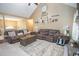 Comfortable living room featuring plush sofas, a coffee table, and tasteful decor creating a warm atmosphere at 241 Lost Lake Way, Villa Rica, GA 30180