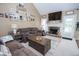 Cozy living room with fireplace, comfortable seating, and ample natural light, creating an inviting atmosphere at 241 Lost Lake Way, Villa Rica, GA 30180