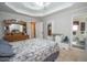 Main bedroom with a neutral color scheme, carpet flooring, and ensuite bathroom at 241 Lost Lake Way, Villa Rica, GA 30180