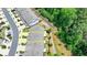 An aerial view of a townhome showing its position next to green space for outdoor enjoyment at 315 Duval Dr, Alpharetta, GA 30009