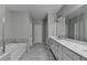 Bathroom with tub and separate shower, double sink vanity, and tile flooring at 315 Duval Dr, Alpharetta, GA 30009
