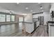 Modern kitchen with stainless steel appliances, granite countertops, and an island with seating at 315 Duval Dr, Alpharetta, GA 30009