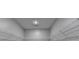 Walk-in closet with shelving perfect for storing clothes and other items at 315 Duval Dr, Alpharetta, GA 30009
