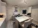 Modern kitchen featuring quartz countertops, subway tile backsplash, and stainless steel appliances at 134 Carolinas Way, Fayetteville, GA 30215