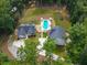 Expansive aerial view of property showcasing pool, backyard, and multiple structures on the estate at 3640 Pollys Blf, Cumming, GA 30028
