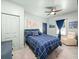 Bright bedroom with blue accents, a large window and a comfortable chair at 3640 Pollys Blf, Cumming, GA 30028