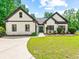 Charming single story home with manicured lawn and beautiful landscaping at 3640 Pollys Blf, Cumming, GA 30028