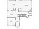 Detailed floor plan showcases the layout of the kitchen, living room, and dining area in the home at 3640 Pollys Blf, Cumming, GA 30028