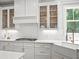 Kitchen with white cabinets, granite countertops, and stainless steel appliances at 3640 Pollys Blf, Cumming, GA 30028