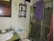 Outdated bathroom with a shower and a toilet at 5114 Fawn Se Trl, Mableton, GA 30126