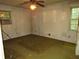 Bedroom featuring aged wall finishes, a window air conditioner, and a dingy carpet at 5114 Fawn Se Trl, Mableton, GA 30126