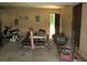 Garage with open door and lawn mower at 5114 Fawn Se Trl, Mableton, GA 30126