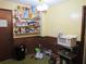 Pantry with shelving, wood paneling, and green checkered floor at 5114 Fawn Se Trl, Mableton, GA 30126