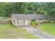 Charming single-story home with well-maintained lawn, a paved driveway, and potential for comfortable living at 96 S Forty Pass S, Hiram, GA 30141