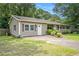 Charming home with a well-maintained lawn, providing a welcoming atmosphere and enhanced curb appeal at 96 S Forty Pass S, Hiram, GA 30141