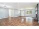Spacious living room with hardwood floors, large windows, and an inviting fireplace at 96 S Forty Pass S, Hiram, GA 30141
