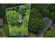 An aerial view of a house surrounded by lush greenery, offering privacy and a serene setting at 1788 River Bluff Vw, Duluth, GA 30097