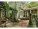 Wooden back deck with outdoor seating, a grill, and lush greenery in a private backyard at 1788 River Bluff Vw, Duluth, GA 30097