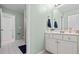 Well-lit bathroom featuring a single sink vanity with a view to the toilet at 1788 River Bluff Vw, Duluth, GA 30097