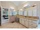 Large bathroom featuring granite countertops, double sinks, and beautiful decor at 1788 River Bluff Vw, Duluth, GA 30097
