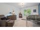 Bright bedroom featuring a modern light fixture, neutral paint, and a combination bed/play structure at 1788 River Bluff Vw, Duluth, GA 30097