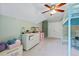 Airy bedroom with light green walls, white trim and furniture, and a fun bunk bed at 1788 River Bluff Vw, Duluth, GA 30097