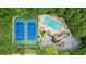 Aerial view of community tennis courts and pool, perfect for recreation and relaxation at 1788 River Bluff Vw, Duluth, GA 30097