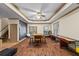 Basement entertainment area with chalkboard wall, game tables and seating at 1788 River Bluff Vw, Duluth, GA 30097