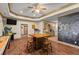 Finished basement with TV area, kitchenette, game consoles and dark trim at 1788 River Bluff Vw, Duluth, GA 30097