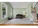 Bright living room features a cozy seating area and a staircase, perfect for relaxation and entertaining guests at 1788 River Bluff Vw, Duluth, GA 30097