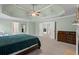 A spacious primary bedroom features a trey ceiling, carpet, and adjoining rooms at 1788 River Bluff Vw, Duluth, GA 30097
