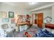 Bedroom area with decor, art, and wooden desk and seating, providing a cozy and functional space at 205 Northampton Ct, Canton, GA 30115