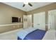 Bedroom with a TV and an ensuite bathroom at 205 Northampton Ct, Canton, GA 30115