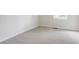 Neutral bedroom with a window and carpet flooring at 2110 Redbud Sw Ct, Marietta, GA 30008