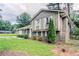 Charming two-story home with a well-maintained lawn and classic shutters, showcasing suburban appeal at 2110 Redbud Sw Ct, Marietta, GA 30008