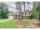 Charming home with a well-maintained front yard and attached one car garage at 2110 Redbud Sw Ct, Marietta, GA 30008