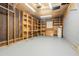 Spacious garage with shelving and unfinished walls at 2110 Redbud Sw Ct, Marietta, GA 30008